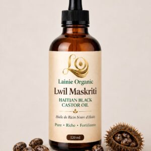 Lwil Maskriti — Huile de ricin noire d'Haïti dans flacon ambré avec graines de ricin